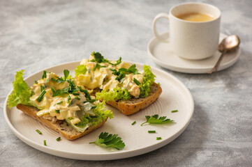 Wall Mural - Egg salad sandwiches, on light background.