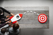 © alotofpeople - Business team and rocket