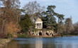 Romantic winter view of the Temple of Love and the artificial grotto on the Isle de Reuilly located on the Lac Daumesnil in the largest parisian public park 