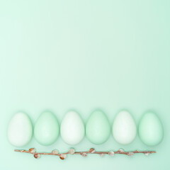 Creative flat lay photo of easter eggs on colorful background.