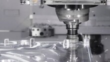 Automated Programmed CNC Vertical Milling Machine With Face Mill Shell Endmill Tool In Process Over Aluminum Metal Piece, Industrial Factory 4k.
