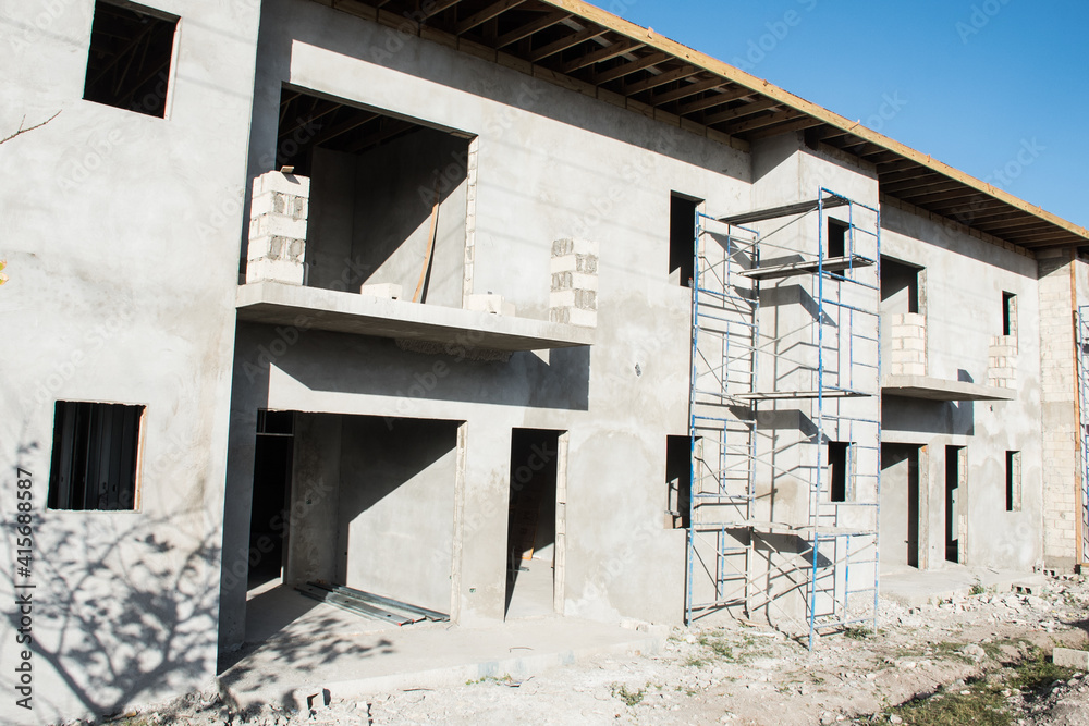 An unfinished construction project. the building is in progress and ...