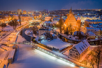 Wall Mural - Aerial view of downtown Bydgoszcz at dusk in winter