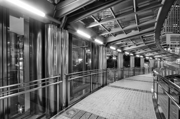 Poster - Empty pedestrian walkway in midtown at night