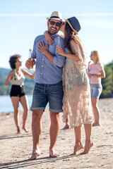 Sticker - Happy couple on the beach