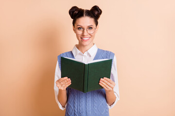 Sticker - Photo of brunette optimistic lady read book wear spectacles white shirt blue vest isolated on beige color background