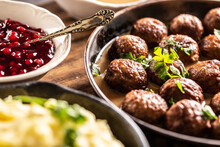 Swedish Food Kottbullar Meatballs, Served In A Pan With Mashed Potatoes, Parsley And Cranberry Sauce