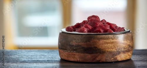 Bowl with raw beef on table © exclusive-design