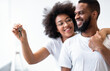 © Prostock-studio - Happy Black Spouses Holding New House Key Embracing At Home