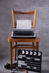 Poster - Vintage typewriter at wooden old shelf near wall background surface