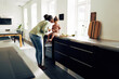© Flamingo Images - Loving mom and her little daughter eating a snack at home