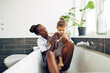 © Flamingo Images - Young mom teaching her little daughter how to brush her teeth