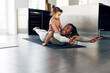 © Flamingo Images - Smiling mother and her little girl playing together at home