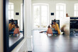 © Flamingo Images - Young mother looking after her daughter while working from home