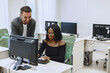 © hetmanstock2 - African woman with friend. Man and woman communicate. Students study computer science.
