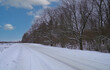 © Иван Сомов - a road passing the edge of the forest.winter in the russian federation