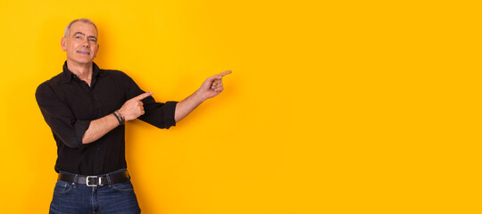 isolated adult man pointing to space