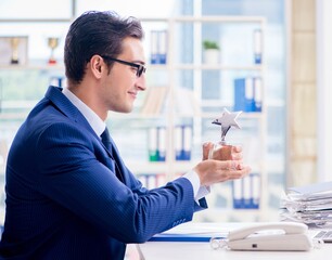 businessman winning best employee of the month award