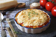 Tomato crumble with aromatic herbs and parmesan cheese