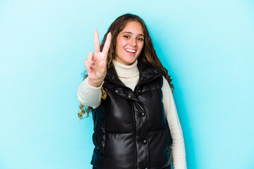 Young caucasian curly hair woman isolated showing number two with fingers.