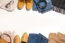 Flat Lay Composition With Stylish Clothes And Accessories On White Background. Space For Text
