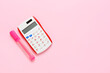 © Pixel-Shot - Modern calculator and marker on color background