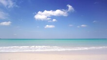 The Sea And Nature Are Always Beautiful. White Beach Sand Blue Sea Blue Sky With Cloud Background.