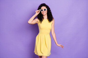 Sticker - Photo of confident pretty lady toothy beaming smile wear sunglass yellow mini dress isolated violet background