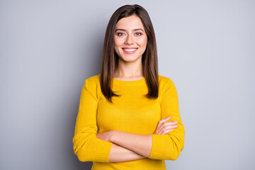 Wall Mural - photo of young happy cheerful positive smiling girl with crossed hands wear yellow jumper isolated o