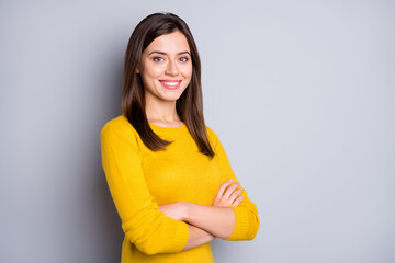 Wall Mural - photo of young happy cheerful positive attractive girl with crossed hands look camera isolated on gr