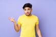 © luismolinero - Arabian handsome man over isolated background making doubts gesture