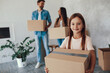 © Afshar Tetyana - Young couple and their cute kid moving to new place