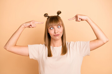 Sticker - Photo of childish playful lady squint grimace direct fingers herself wear t-shirt isolated beige color background