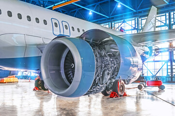 Wall Mural - Elimination of malfunctions in the aircraft engine in the aircraft hangar, mechanical repair, check of all systems.