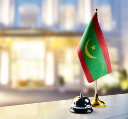 Mauritania flag on the reception desk in the lobby of the hotel