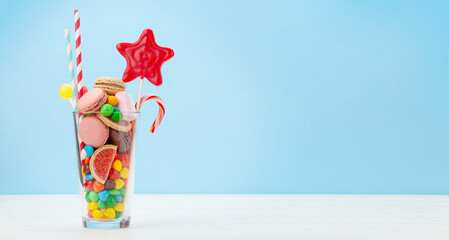 Wall Mural - Various sweets in cocktail glass