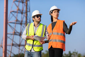 Wall Mural - Professional Mechanical Engineer teamwokr. Construction manager and engineer working on construction building site. construction engineer driving