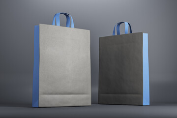 Poster - Blank blue and black eco friendly paper bags at dark background. Mock up