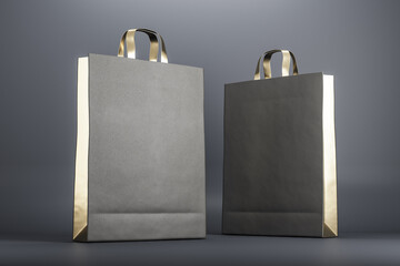 Aufkleber - Two recycled paper bags with golden decoration on dark surface. Mock up