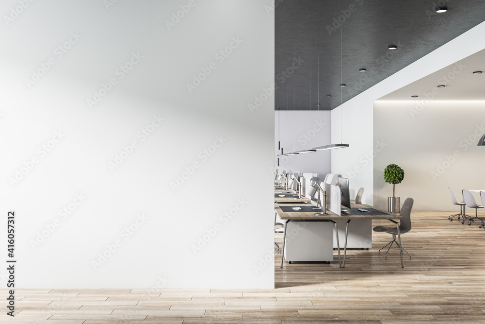 Blank light grey wall in sunny open space office with wooden floor and eco style furniture. Mockup - obrazy, fototapety, plakaty 