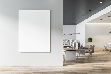 Poster - Blank white poster on light grey wall in modern open space office with light furniture and wooden floor. Mock up
