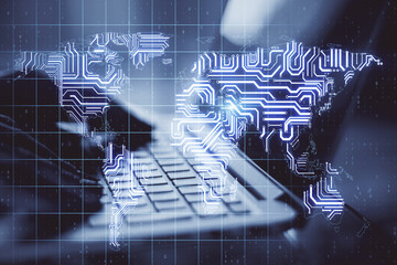 Aufkleber - Big data concept with human hand typing on laptop keyboard ans abstract digital microchip world map