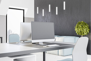 Aufkleber - Blank grey computer monitor on modern table in light office with grey wall and city view. Mockup