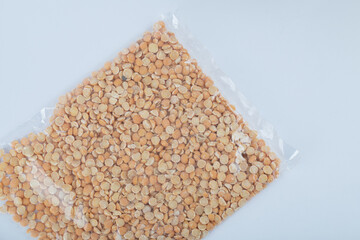 Close up view of dried wrapping brown lentils