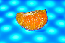 Pulp Of Yellow Tangerine. Textured. Blue Background. Macro