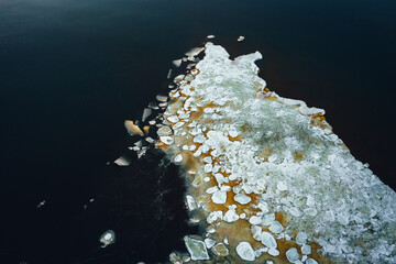 Wall Mural - Beautiful view of frozen seawater and ice texture in winter, Ice floes in Baltic seawater.