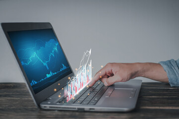 Businessman hand show Stock chart showing rising stock sign with graph indicator. Interest rate financial and mortgage rates concept. Double Exposure Image.