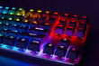 Mechanical gaming keyboard with backlight, close-up. Gaming keyboard with RGB backlight. RGB LED keyboard.