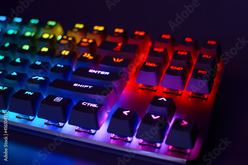 Mechanical gaming keyboard with backlight, close-up. Gaming keyboard with RGB backlight. RGB LED keyboard.