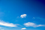 Fototapeta Na sufit - Blue sky with scattered blue clouds